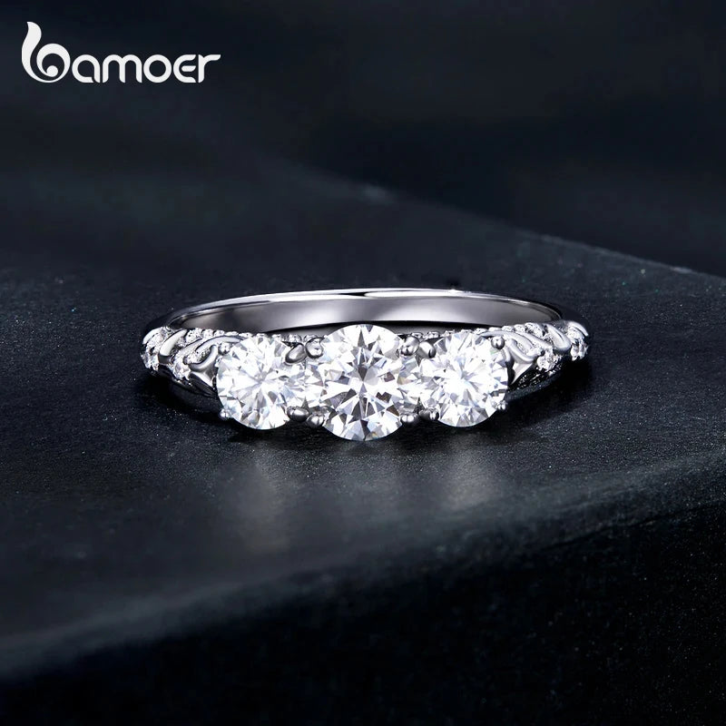 BAMOER 1.1CTTW Round Moissanite Ring for Women, White Gold Plated D Color VVS1 Lab Diamond 925 Sterling Silver Engagement Ring
