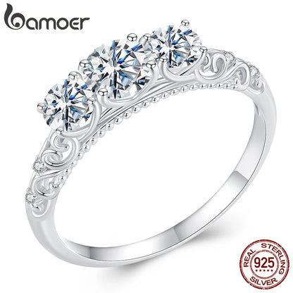 BAMOER 1.1CTTW Round Moissanite Ring for Women, White Gold Plated D Color VVS1 Lab Diamond 925 Sterling Silver Engagement Ring