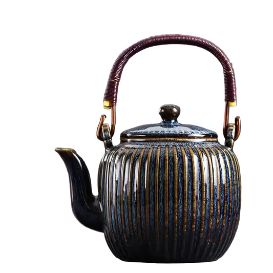 Decorative teapot with ribbed design and wicker handle 
